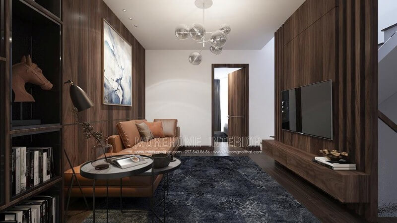 Điểm nhấn sofa da màu cam ấn tượng cho phòng khách hiện đại trang trí tường từ gỗ ốp tối màu. Thiết kế biệt thự