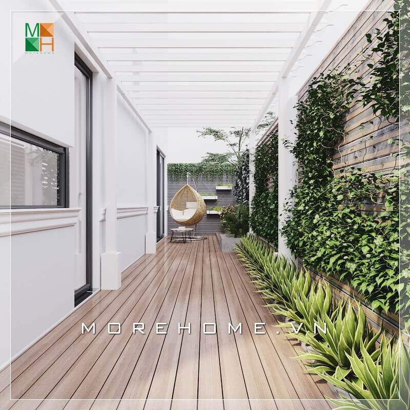 Lát nền lối đi hông nhà biệt thự đẹp bằng gỗ sang trọng và hiện đại tạo nên một không gian thư giãn hoàn hảo nhất. thiết kế biệt thự