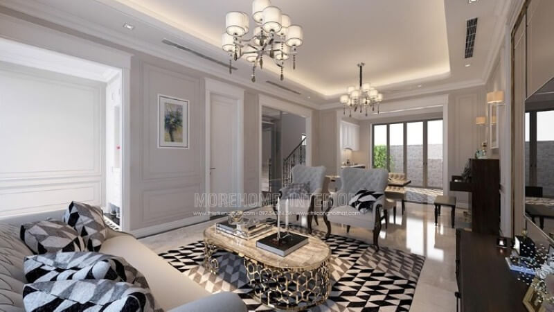 Thiết kế nội thất phòng khách thoáng mát và sang chảnh với mẫu đồ nội thất tự nhiên màu trắng sữa kết hợp chi tiết màu đen lôi cuốn thiết kế biệt thự