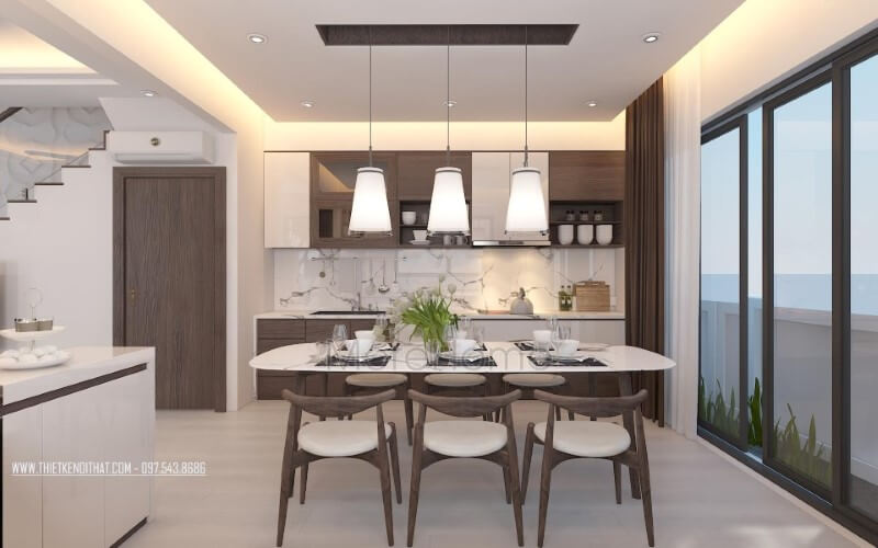 Bộ bàn ghế ghế gỗ óc chó tự nhiên kết hợp tủ bếp hiện đại vân gỗ óc chó tạo nên vẻ đẹp đồng nhất nhưng không kém phần độc đáo trong gian bếp hiện đại. thiết kế biệt thự
