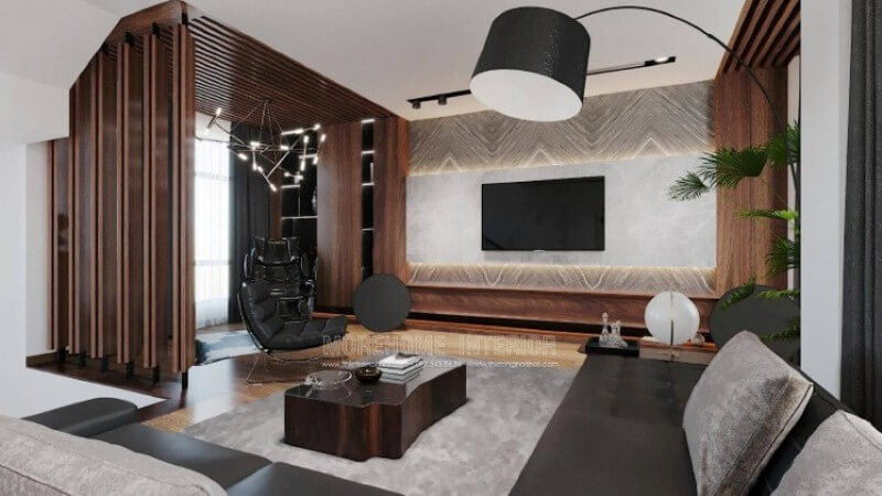Có thể nói sofa góc là một trong những lựa chọn không thể bỏ qua cho mọi không gian đặc biệt trong thiết kế nội thất phòng khách biệt thự. Tuy nhiên cách kết hợp làm sao để tất cả tạo nên vẻ đẹp tổng hòa từ gam màu bộ sofa, kiểu dáng bàn trà. Như trong mẫu thiết kế nội thất phòng khách biệt thự này, kts Morehome đã lựa chọn chiếc bàn gỗ nguyên tấm gỗ óc chó, loại gỗ quý với vô vàn điểm mạnh, vân gỗ 3D tuyệt đẹp, gam màu độc đáo ko đơn điệu chuyển hóa từ nâu nhạt đến socola đậm hơn là tím đỏ,.. Thiết kế biệt thự