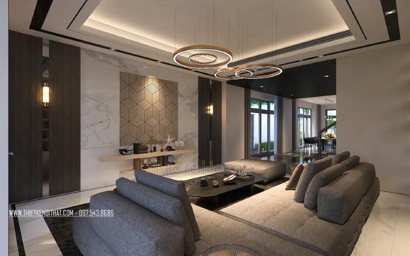 Đá kết hợp cùng gỗ ốp tường là một trong những xu hướng ấn tượng trong trang trí phòng khách hiện đại, cao cấp.