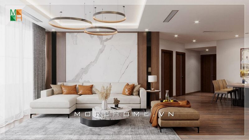 Một bộ sofa gỗ bọc nỉ chữ L, một bàn trà bằng đá nhân tạo với đèn thả kiểu cách, vách tường đá kết hợp cùng gỗ, tất cả tổng thể tạo nên một căn phòng khách vô cùng ấn tượng, thể hiện gu thẩm mỹ tinh tế của gia chủ