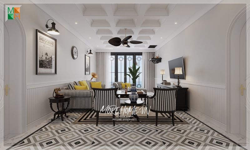 Thiết kế phòng khách chung cư, nhà phố, biệt thự phong cách Indochine, với tông màu đen - trắng chủ đạo, điểm nhấn là gối ôm màu vàng, tạo ấn tượng cho không gian phòng khách